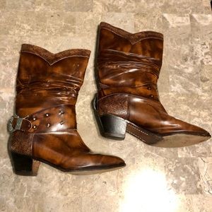 Brown leather cowboy style boots